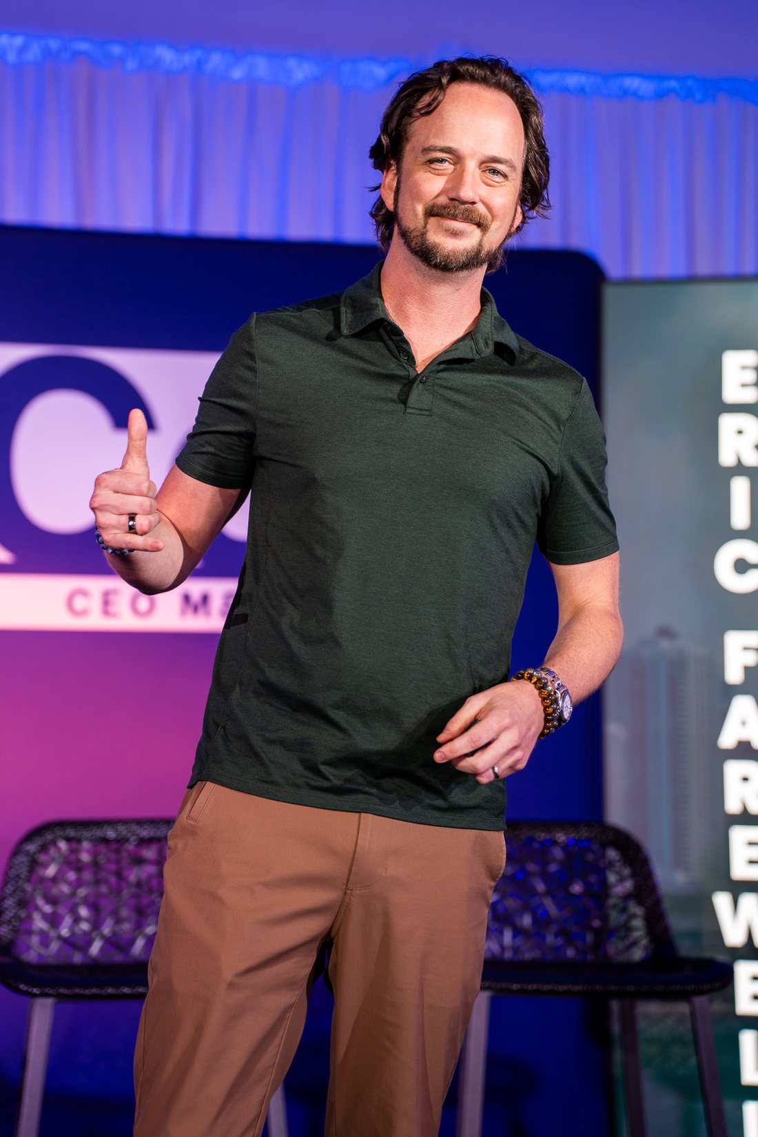 Eric Farewell speaking on stage